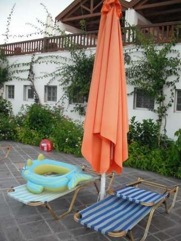 Отель Marmari Beach Apartment Suites 4*