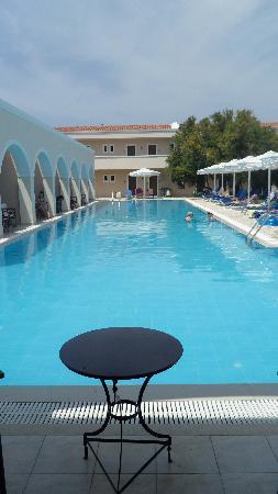 Отель Mitsis Roda Beach Resort & Spa 5*